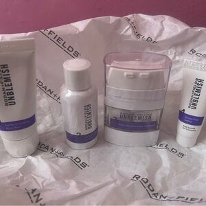 Rodan + Fields Unblemish Skincare Set in White and Purple